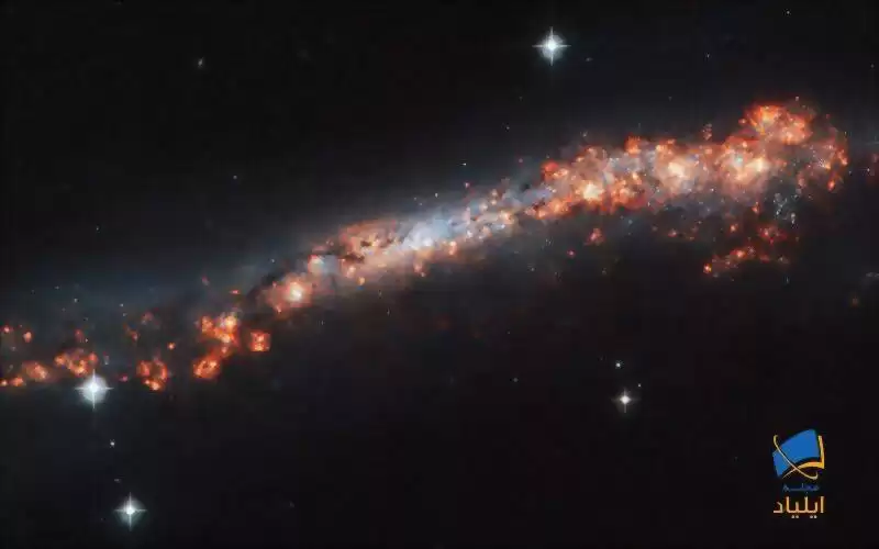 کهکشانی زیبا با مناطق ستاره‌زایی فراوان
