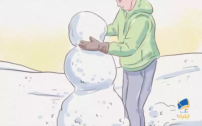 غلتاندن برف برای ساخت آدم برفی